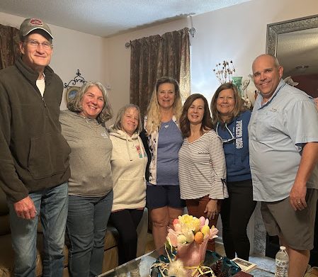 Small group gathering for fellowship and celebration