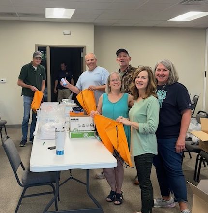 Volunteers packing supplies for community outreach
